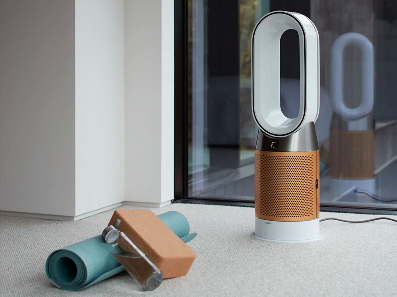  Dyson air purifier next to yoga mat, block and exercise water bottle